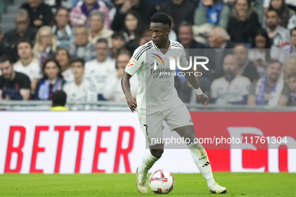 Vinicius Junior left winger of Real Madrid and Brazil during the La Liga match between Real Madrid CF and CA Osasuna at Estadio Santiago Ber...