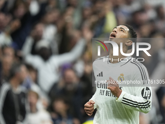 Jude Bellingham central midfield of Real Madrid and England celebrates after scoring his sides first goal during the La Liga match between R...