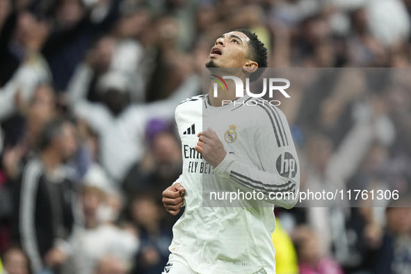 Jude Bellingham central midfield of Real Madrid and England celebrates after scoring his sides first goal during the La Liga match between R...