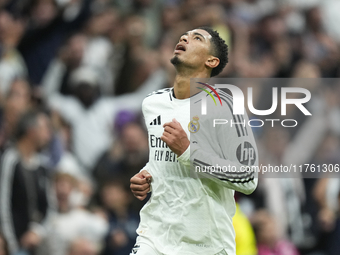 Jude Bellingham central midfield of Real Madrid and England celebrates after scoring his sides first goal during the La Liga match between R...