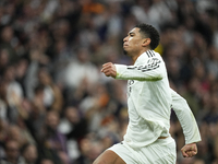 Jude Bellingham central midfield of Real Madrid and England celebrates after scoring his sides first goal during the La Liga match between R...