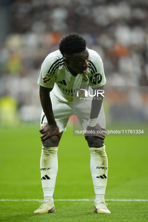 Vinicius Junior left winger of Real Madrid and Brazil reacts during the La Liga match between Real Madrid CF and CA Osasuna at Estadio Santi...