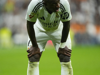 Vinicius Junior left winger of Real Madrid and Brazil reacts during the La Liga match between Real Madrid CF and CA Osasuna at Estadio Santi...