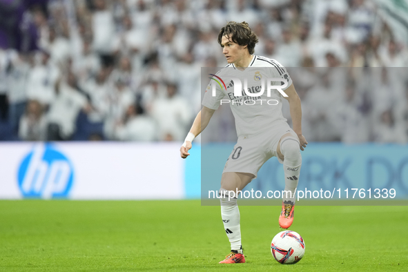 Fran Garcia left-back of Real Madrid and Spain controls the ball during the La Liga match between Real Madrid CF and CA Osasuna at Estadio S...