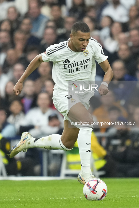 Kylian Mbappe centre-forward of Real Madrid and France in action during the La Liga match between Real Madrid CF and CA Osasuna at Estadio S...