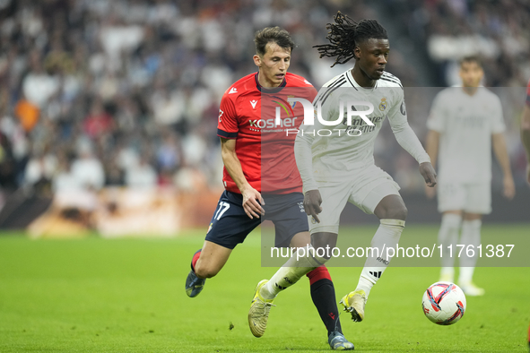 Eduardo Camavinga central midfield of Real Madrid and France and Ante Budimir centre-forward of Osasuna and Croatia compete for the ball dur...