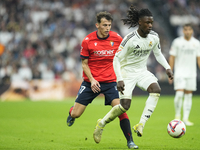 Eduardo Camavinga central midfield of Real Madrid and France and Ante Budimir centre-forward of Osasuna and Croatia compete for the ball dur...