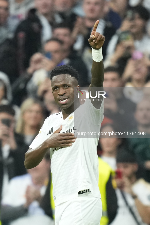 Vinicius Junior left winger of Real Madrid and Brazil celebrates after scoring his sides second goal during the La Liga match between Real M...