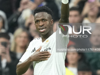 Vinicius Junior left winger of Real Madrid and Brazil celebrates after scoring his sides second goal during the La Liga match between Real M...