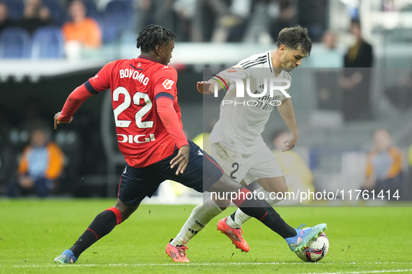 Brahim Diaz attacking midfield of Real Madrid and Spain and Enzo Boyomo centre-back of Osasuna and Cameroon compete for the ball during the...