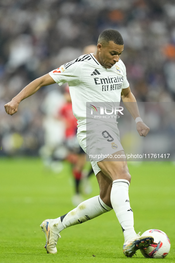 Kylian Mbappe centre-forward of Real Madrid and France during the La Liga match between Real Madrid CF and CA Osasuna at Estadio Santiago Be...