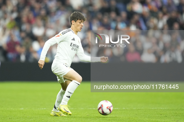 Arda Guler attacking midfield of Real Madrid and Turkey during the La Liga match between Real Madrid CF and CA Osasuna at Estadio Santiago B...