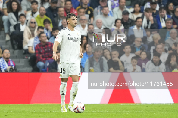 Raul Asencio centre-back of Real Madrid and Spain during the La Liga match between Real Madrid CF and CA Osasuna at Estadio Santiago Bernabe...