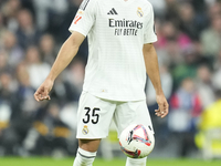 Raul Asencio centre-back of Real Madrid and Spain during the La Liga match between Real Madrid CF and CA Osasuna at Estadio Santiago Bernabe...