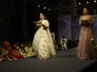 A city industrialist in Indian traditional dress walks the runway during a fashion show organized by Lions International at JW Marriott in K...