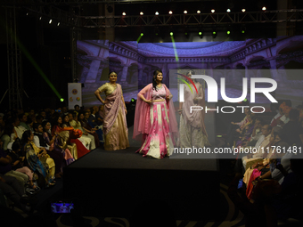 A city industrialist in Indian traditional dress walks the runway during a fashion show organized by Lions International at JW Marriott in K...