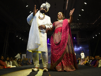 A city industrialist in Indian traditional dress walks the runway during a fashion show organized by Lions International at JW Marriott in K...