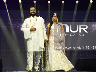 A city industrialist in Indian traditional dress walks the runway during a fashion show organized by Lions International at JW Marriott in K...