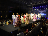 A city industrialist in Indian traditional dress walks the runway during a fashion show organized by Lions International at JW Marriott in K...