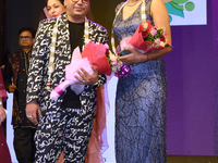 Fashion designer Tejas Gandhi and model Madhabilata Mitra participate in a fashion show organized by Lions International in JW Marriott, Kol...