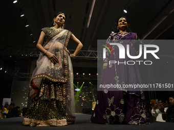 A city industrialist in Indian traditional dress walks the runway during a fashion show organized by Lions International at JW Marriott in K...