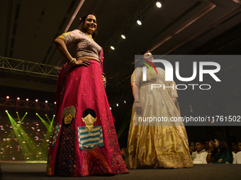 A city industrialist in Indian traditional dress walks the runway during a fashion show organized by Lions International at JW Marriott in K...