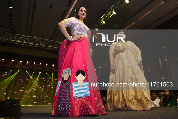 A city industrialist in Indian traditional dress walks the runway during a fashion show organized by Lions International at JW Marriott in K...