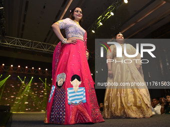 A city industrialist in Indian traditional dress walks the runway during a fashion show organized by Lions International at JW Marriott in K...