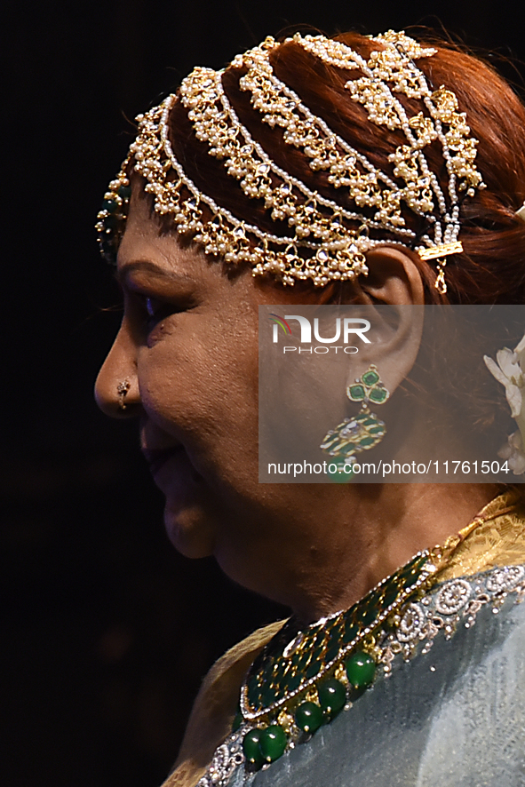 A city industrialist participates in a fashion show featuring Indian traditional jewelry organized by Lions International at JW Marriott in...