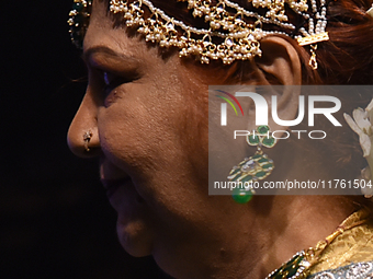 A city industrialist participates in a fashion show featuring Indian traditional jewelry organized by Lions International at JW Marriott in...