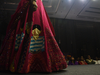 A city industrialist in Indian traditional dress walks the runway during a fashion show organized by Lions International at JW Marriott in K...