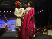 A city industrialist in Indian traditional dress walks the runway during a fashion show organized by Lions International at JW Marriott in K...