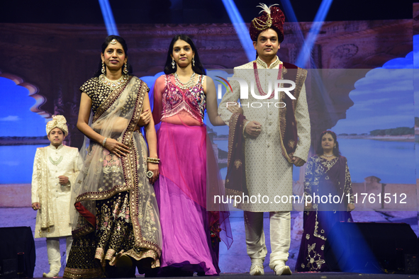 A city industrialist in Indian traditional dress walks the runway during a fashion show organized by Lions International at JW Marriott in K...