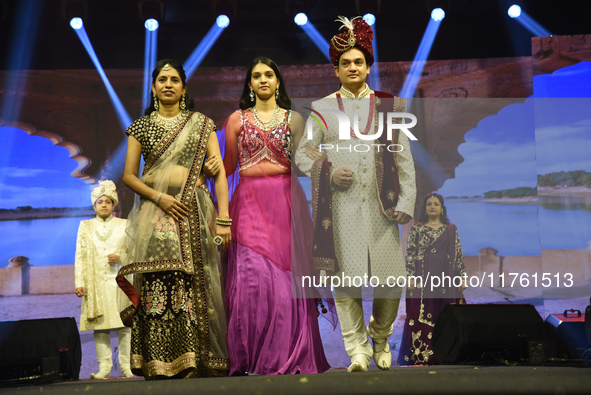 A city industrialist in Indian traditional dress walks the runway during a fashion show organized by Lions International at JW Marriott in K...