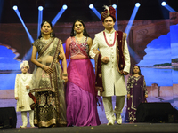 A city industrialist in Indian traditional dress walks the runway during a fashion show organized by Lions International at JW Marriott in K...