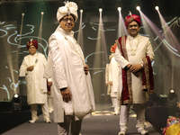 A city industrialist in Indian traditional dress walks the runway during a fashion show organized by Lions International at JW Marriott in K...