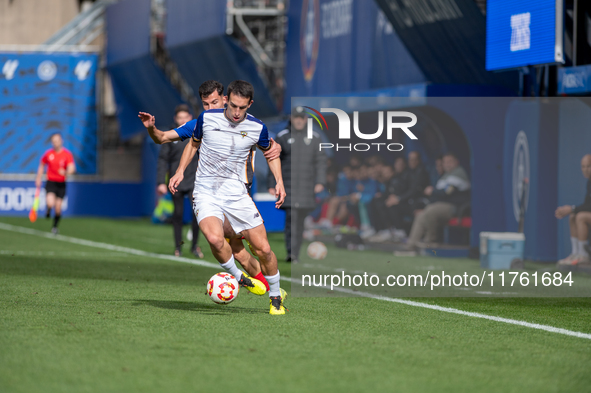 Luismi Redondo of FC Andorra and Iker Pedernales of Barakaldo CF are in action during the Primera RFEF 2024-2025 match between FC Andorra an...