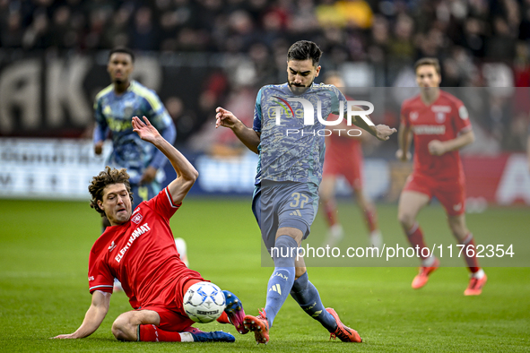 FC Twente forward Sam Lammers and AFC Ajax Amsterdam defender Josip Sutalo play during the match between Twente and Ajax at the Grolsch Vest...