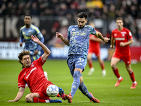 FC Twente forward Sam Lammers and AFC Ajax Amsterdam defender Josip Sutalo play during the match between Twente and Ajax at the Grolsch Vest...