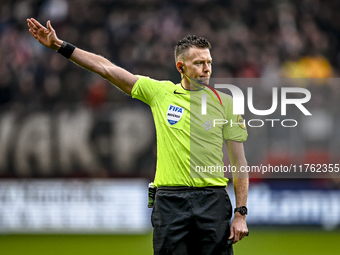 Referee Allard Lindhout officiates during the match between Twente and Ajax at the Grolsch Veste Stadium for the Dutch Eredivisie season 202...