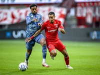 AFC Ajax Amsterdam forward Chuba Akpom and FC Twente defender Anass Salah-Eddine play during the match between Twente and Ajax at the Grolsc...