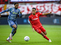 AFC Ajax Amsterdam forward Chuba Akpom and FC Twente defender Anass Salah-Eddine play during the match between Twente and Ajax at the Grolsc...