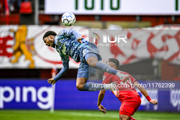 AFC Ajax Amsterdam forward Chuba Akpom and FC Twente defender Anass Salah-Eddine play during the match between Twente and Ajax at the Grolsc...