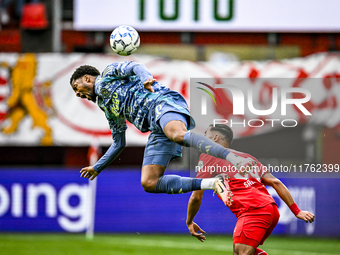 AFC Ajax Amsterdam forward Chuba Akpom and FC Twente defender Anass Salah-Eddine play during the match between Twente and Ajax at the Grolsc...