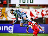 AFC Ajax Amsterdam forward Chuba Akpom and FC Twente defender Anass Salah-Eddine play during the match between Twente and Ajax at the Grolsc...