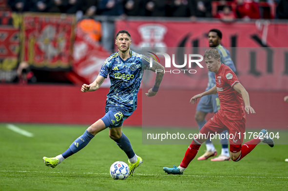 FC Twente defender Max Bruns and AFC Ajax Amsterdam forward Wout Weghorst play during the match between Twente and Ajax at the Grolsch Veste...