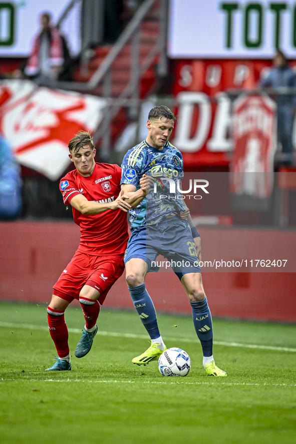 FC Twente defender Max Bruns and AFC Ajax Amsterdam forward Wout Weghorst play during the match between Twente and Ajax at the Grolsch Veste...