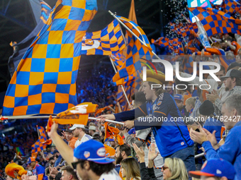 Cincinnati supporters are seen during the 2024 MLS Cup Playoffs Round One match between FC Cincinnati and New York City FC at TQL Stadium in...