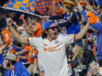 Cincinnati supporters are seen during the 2024 MLS Cup Playoffs Round One match between FC Cincinnati and New York City FC at TQL Stadium in...