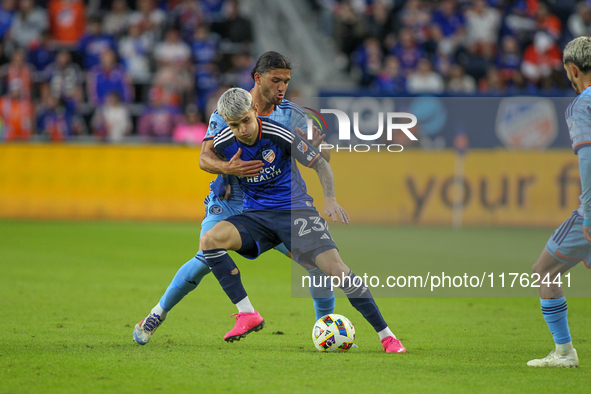 Cincinnati's Luca Orellano and New York's Justin Haak compete for the ball during the 2024 MLS Cup Playoffs Round One match between FC Cinci...